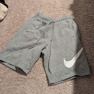 Gray Nike Shorts with White Logo Size M